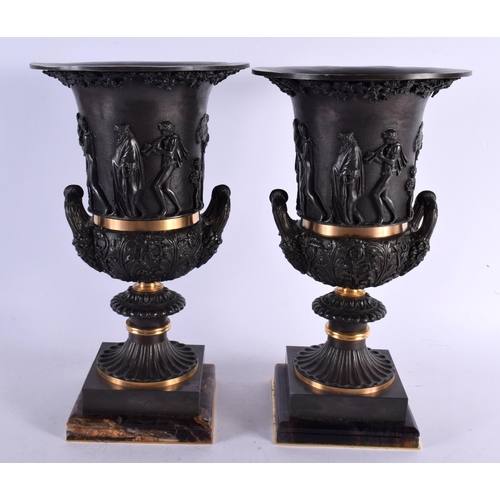 495 - A PAIR OF CONTEMPORARY BRONZE AND BLUEJOHN TWIN HANDLED CAMPAGNA URN VASES. 40 cm x 18 cm.