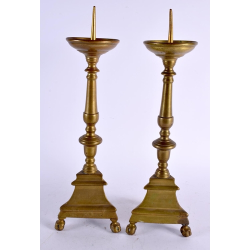 496 - A PAIR OF 18TH CENTURY EUROPEAN BRONZE PRICKET CANDLESTICKS. 38 cm high.