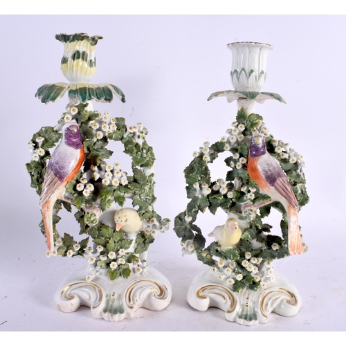 50 - A PAIR OF 18TH CENTURY ENGLISH PORCELAIN CANDLESTICKS probably Bow or Derby, formed with parrots amo... 