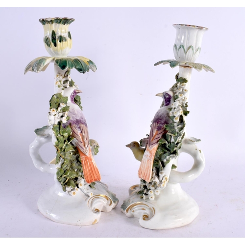 50 - A PAIR OF 18TH CENTURY ENGLISH PORCELAIN CANDLESTICKS probably Bow or Derby, formed with parrots amo... 