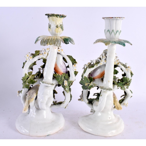 50 - A PAIR OF 18TH CENTURY ENGLISH PORCELAIN CANDLESTICKS probably Bow or Derby, formed with parrots amo... 