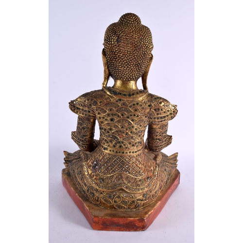 501 - A LARGE SOUTH EAST ASIAN POLYCHROMED WOOD FIGURE OF.A BUDDHA. 45 cm x 25 cm.