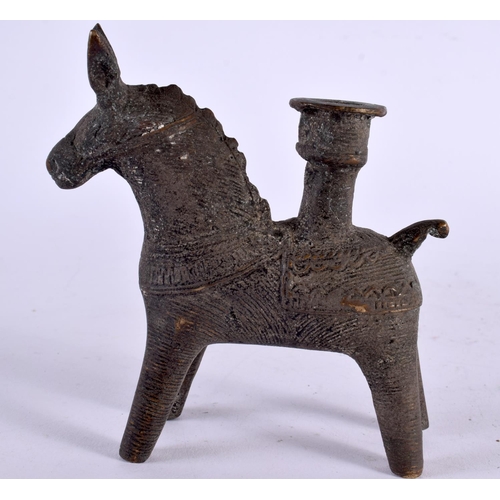 506 - AN ANTIQUE MIDDLE EASTERN BENIN BRONZE FIGURE OF A HORSE. 12 cm x 12 cm.