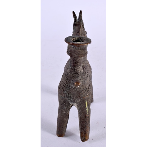 506 - AN ANTIQUE MIDDLE EASTERN BENIN BRONZE FIGURE OF A HORSE. 12 cm x 12 cm.