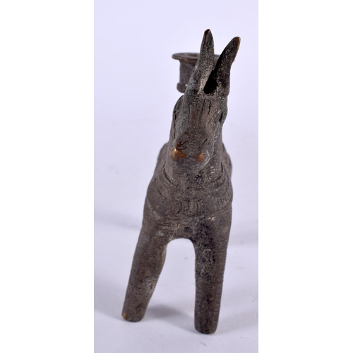 506 - AN ANTIQUE MIDDLE EASTERN BENIN BRONZE FIGURE OF A HORSE. 12 cm x 12 cm.