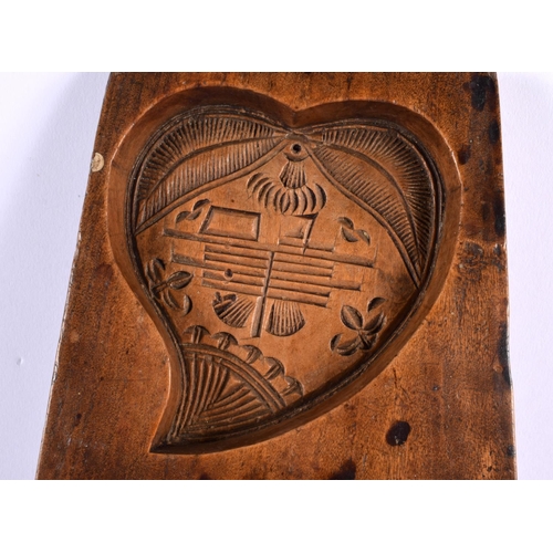 508 - A TREEN CARVED WOOD BISCUIT MOULD. 25 cm x 15 cm.