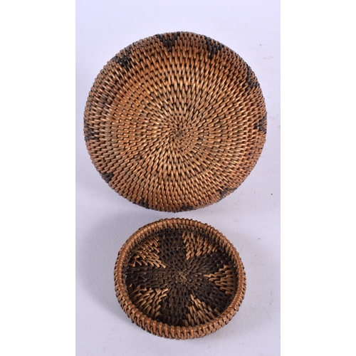 509 - AN EARLY 20TH CENTURY TRIBAL CARVED WICKER WORK ROTI BASKET. 12 cm x 10 cm.