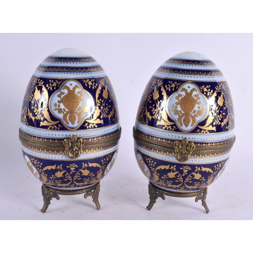 51 - A PAIR OF EARLY 20TH CENTURY FRENCH BRONZE AND PORCELAIN EGGS probably Limoges in the Sevres style. ... 