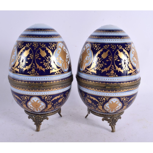 51 - A PAIR OF EARLY 20TH CENTURY FRENCH BRONZE AND PORCELAIN EGGS probably Limoges in the Sevres style. ... 