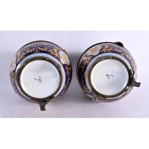 51 - A PAIR OF EARLY 20TH CENTURY FRENCH BRONZE AND PORCELAIN EGGS probably Limoges in the Sevres style. ... 