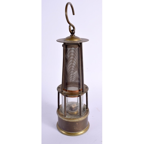 512 - AN UNUSUAL ANTIQUE MESH MINERS LAMP. 26 cm high.