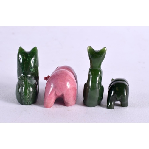 514 - FOUR CONTINENTAL CARVED RHODONITE AND JADE FIGURES possiibly Russian. Largest 3.5 cm x 2.5 cm. (4)