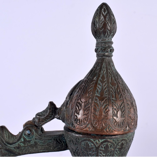 528 - A PAIR OF 19TH CENTURY MIDDLE EASTERN BRONZED COPPER EWERS decorated with foliage and vines. 32 cm x... 