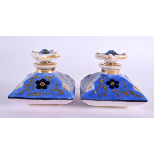 53 - A PAIR OF 19TH CENTURY FRENCH PORCELAIN SCENT BOTTLES together with an inkwell and another. Largest ... 