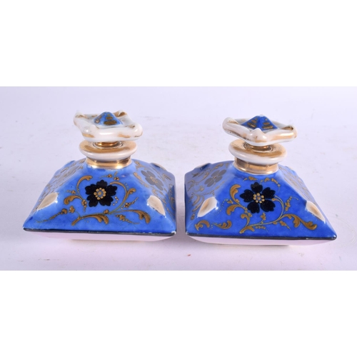 53 - A PAIR OF 19TH CENTURY FRENCH PORCELAIN SCENT BOTTLES together with an inkwell and another. Largest ... 