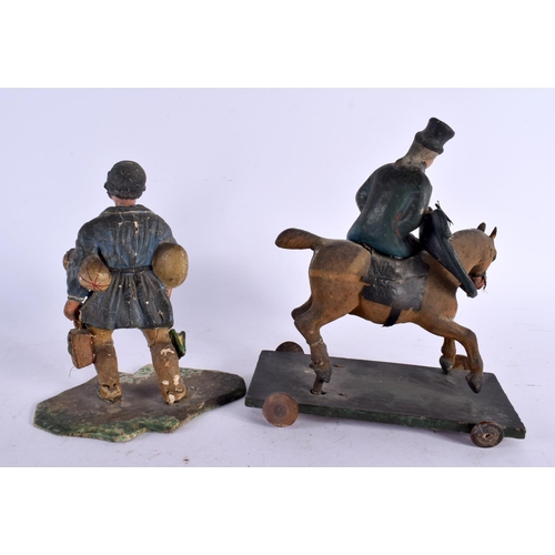 540 - A RARE PAIR OF 19TH CENTURY CONTINENTAL FOLK ART PAPIER MACHE WOOD FIGURES with articulated features... 