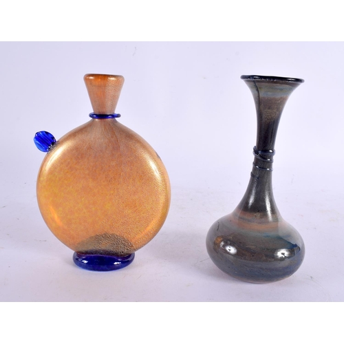 55 - TWO IRIDESCENT GLASS VASES together with a jug and bowl. Largest 13 cm high. (4)