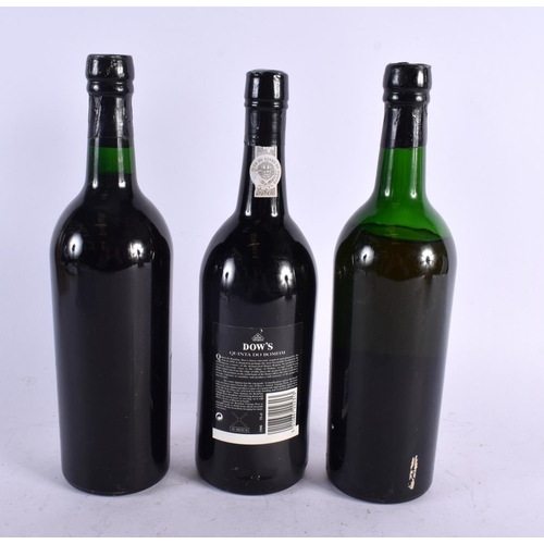 553 - TWO BOTTLES OF 1967 COCKBURNS PORT together with a 1986 Dows Quinta Do Bomfim port. (3)