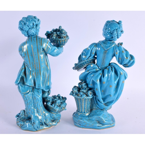 57 - A PAIR OF 19TH BLUE GLAZED PORCELAIN FIGURES OF A BOY AND GIRL Minton or Sevres, painted with gilt f... 