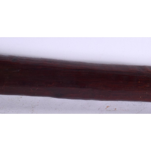 580 - AN UNUSUAL 19TH CENTURY POLYNESIAN MAORI CARVED WOOD AND STONE TRIBAL CLUB. 70 cm long.