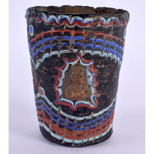 59 - A 19TH CENTURY MIDDLE EASTERN GARBI GLASS CYLINDRICAL GOBLET After the Antiquity, inset with mask he... 