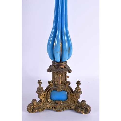 604 - A RARE LARGE 19TH CENTURY BLUE OPALINE GLASS AND BRONZE OIL LAMP. 80 cm high.