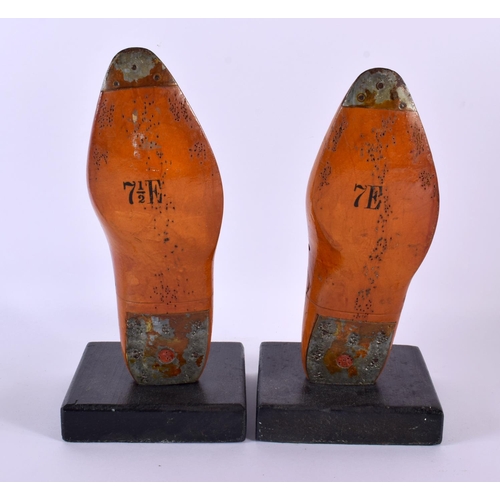 608 - A PAIR OF VINTAGE SHOE LAST BOOK ENDS. 32 cm x 10 cm.