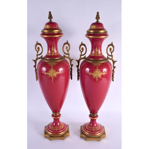 610 - A LARGE PAIR OF 19TH CENTURY FRENCH SEVRES STYLE COUNTRY HOUSE LAMPS painted with lovers within land... 