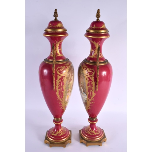 610 - A LARGE PAIR OF 19TH CENTURY FRENCH SEVRES STYLE COUNTRY HOUSE LAMPS painted with lovers within land... 