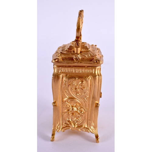 611 - A CONTEMPORARY MINIATURE BRASS ROCOCO CARRIAGE CLOCK. 9.5 cm high inc handle.