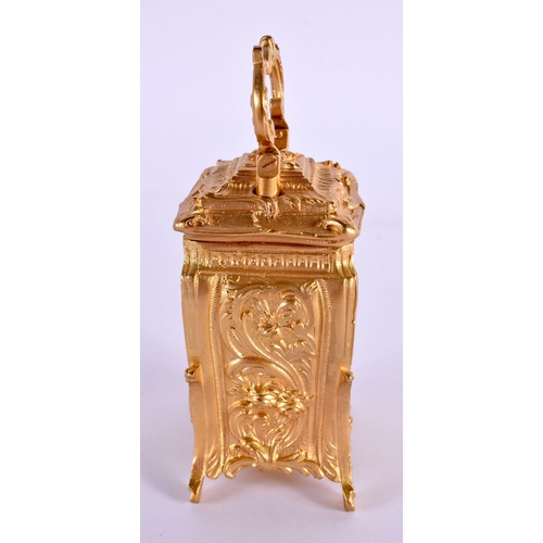 611 - A CONTEMPORARY MINIATURE BRASS ROCOCO CARRIAGE CLOCK. 9.5 cm high inc handle.