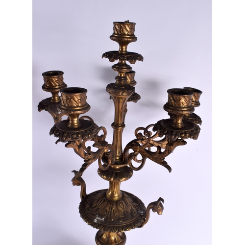 619 - A LARGE PAIR OF 19TH CENTURY FRENCH SIX BRANCH CANDLEABREA modelled upon acanthus capped bases. 54 c... 