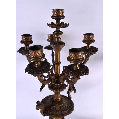 619 - A LARGE PAIR OF 19TH CENTURY FRENCH SIX BRANCH CANDLEABREA modelled upon acanthus capped bases. 54 c... 