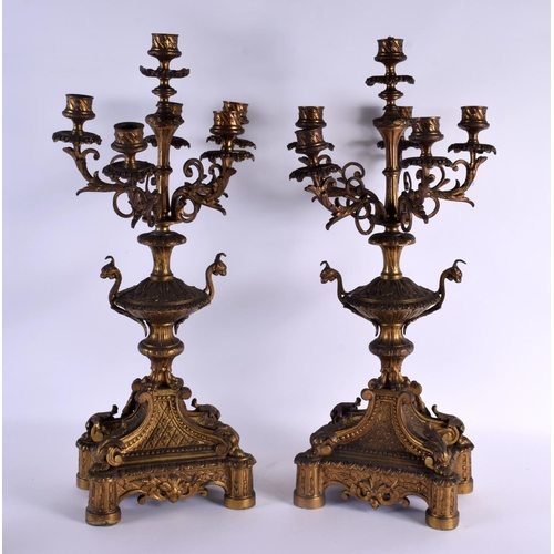 619 - A LARGE PAIR OF 19TH CENTURY FRENCH SIX BRANCH CANDLEABREA modelled upon acanthus capped bases. 54 c... 