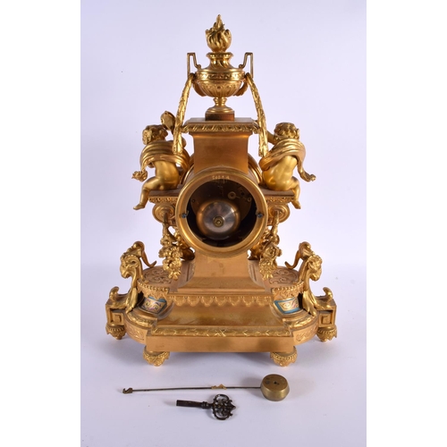 620 - A FINE LARGE 19TH CENTURY FRENCH GILT BRONZE AND SEVRES PORCELAIN MANTEL CLOCK modelled with putti. ... 