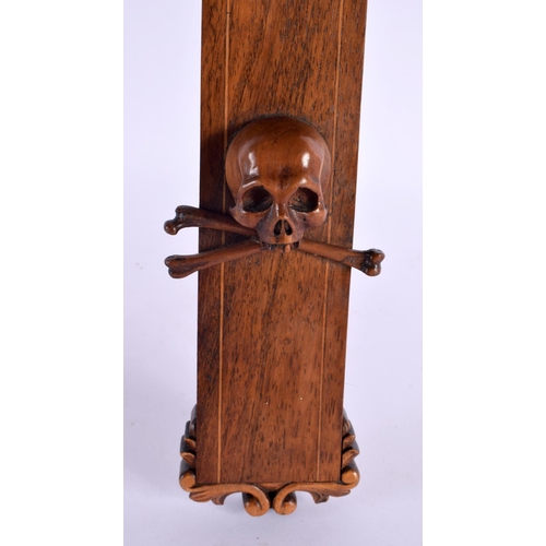 622 - A LARGE 19TH CENTURY EUROPEAN CARVED WOOD CORPUS CHRIST overlaid with a skull. 96 cm x 36 cm.