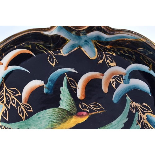 64 - A BELGIAN H BEQUET QUAREGNON POTTERY BIRD OF PARADISE BOWL. 18 cm wide.