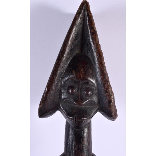 643 - AN AFRICAN TRIBAL CARVED WOOD FIGURE. 40 cm high.