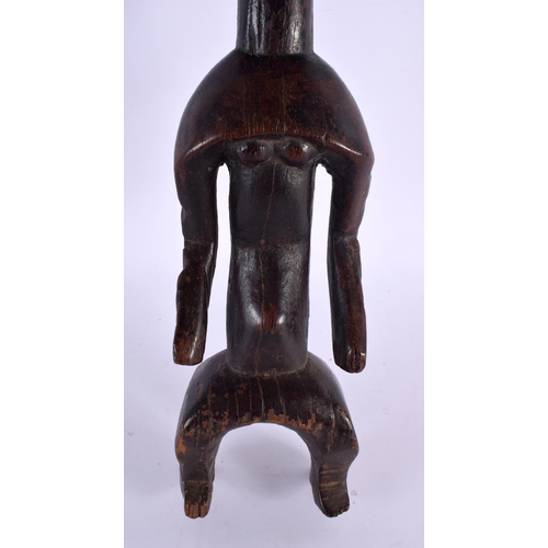 643 - AN AFRICAN TRIBAL CARVED WOOD FIGURE. 40 cm high.