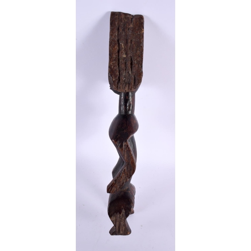 643 - AN AFRICAN TRIBAL CARVED WOOD FIGURE. 40 cm high.