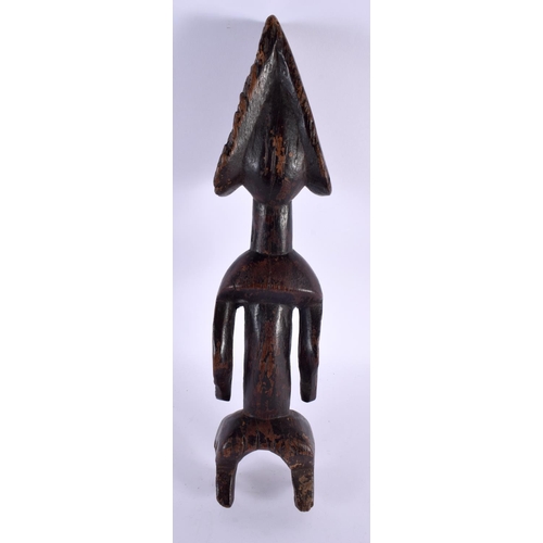 643 - AN AFRICAN TRIBAL CARVED WOOD FIGURE. 40 cm high.