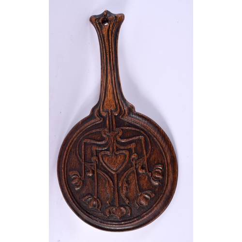 644 - AN ART NOUVEAU CARVED WOOD HAND MIRROR together with a spice tower. Largest 34 cm x 16 cm. (2)