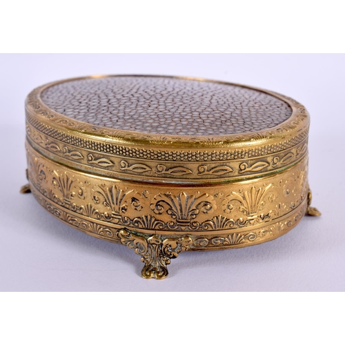 649 - AN ANTIQUE GILT METAL AND SHAGREEN CASKET decorated with fleur de lys. 13 cm x 9 cm.