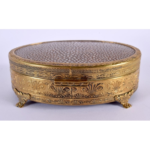 649 - AN ANTIQUE GILT METAL AND SHAGREEN CASKET decorated with fleur de lys. 13 cm x 9 cm.