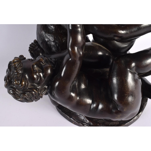 656 - A LARGE 19TH CENTURY FRENCH BRONZE BUST OF WRESTLING PUTTI together with a large enamelled French ur... 