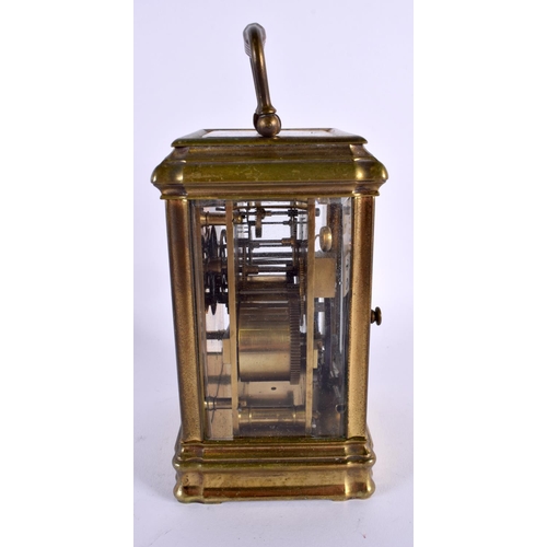 664 - AN ANTIQUE CARRIAGE CLOCK. 17 cm high inc handle.