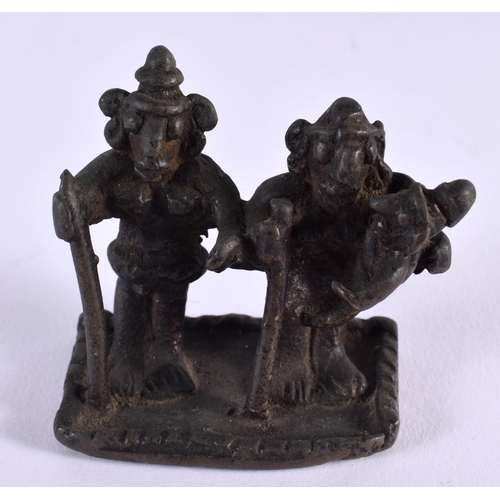 666 - A SMALL ANTIQUE MIDDLE EASTERN BRONZE FIGURAL GROUP together with an African bead neck piece and pot... 