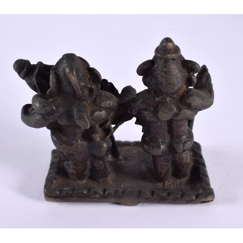 666 - A SMALL ANTIQUE MIDDLE EASTERN BRONZE FIGURAL GROUP together with an African bead neck piece and pot... 