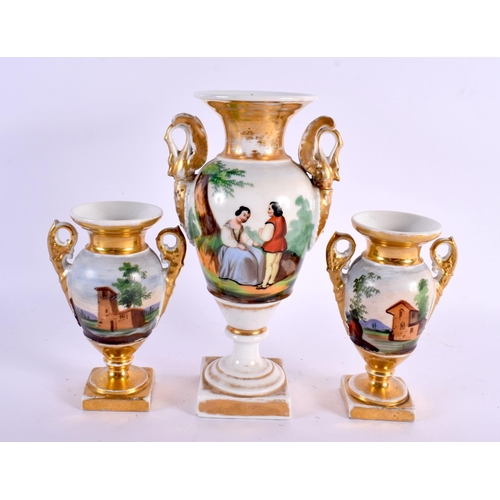 68 - AN EARLY 19TH CENTURY FRENCH PARIS PORCELAIN GARNITURE painted with lovers in landscapes. Largest 23... 