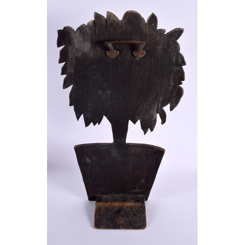 701 - A LARGE 19TH CENTURY CONTINENTAL PAINTED WOOD DOOR STOP formed as a plant pot with fruiting pods. 44... 